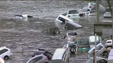 Видео: Нови кадри от убийственото цунами